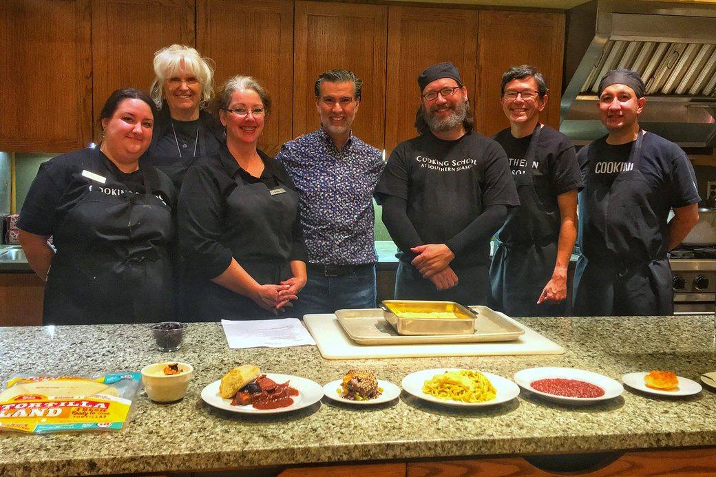 The cooking school team with the plated courses