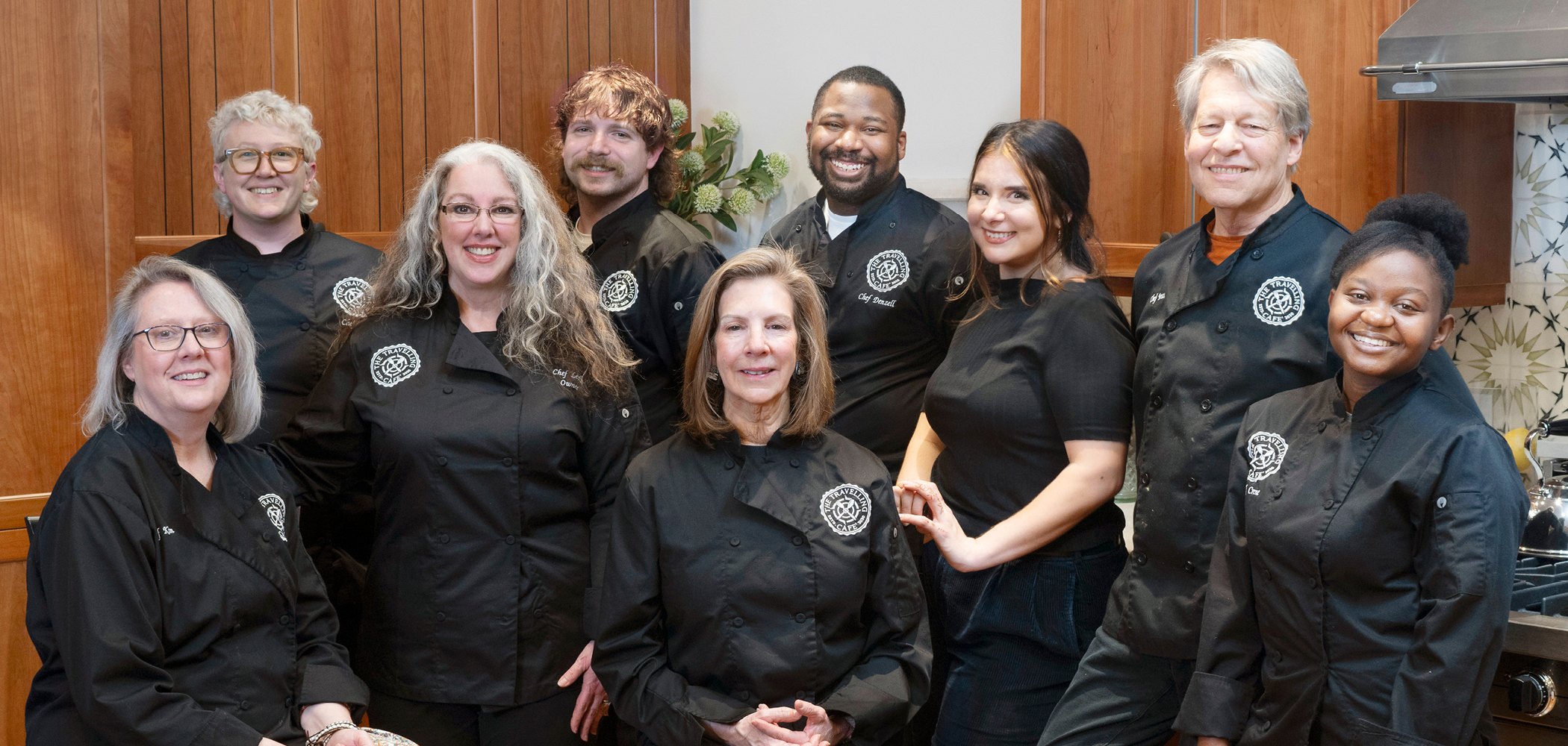 The chefs of The Travelling Cafe collective in their black chef coats