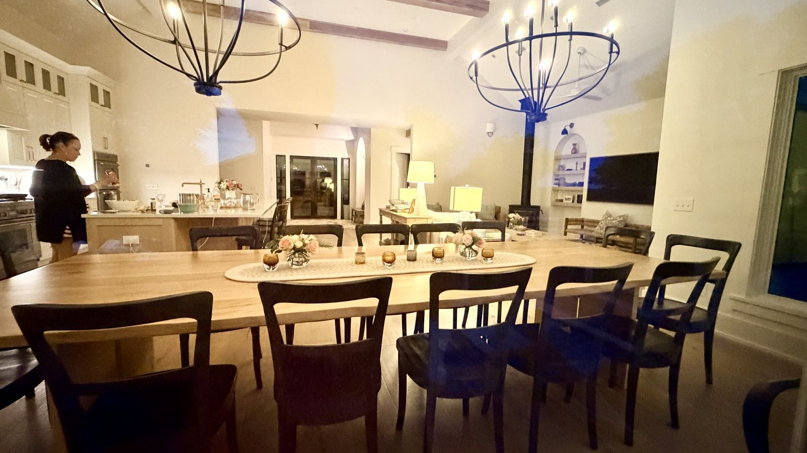 A long dining table set in a vacation home