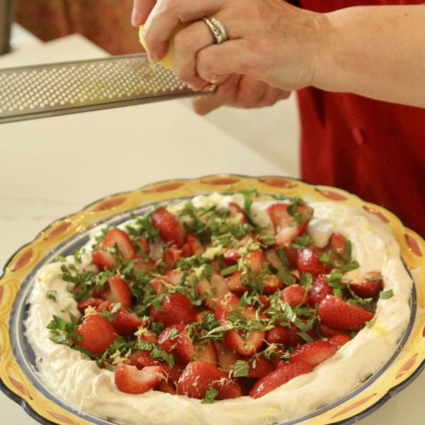 A strawberry dessert finished with fresh basil